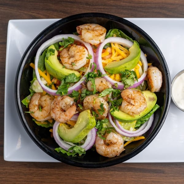 Habaneros Fresh Mexican Grill's shrimp salad with avocado, red onion, cheese, and cilantro.